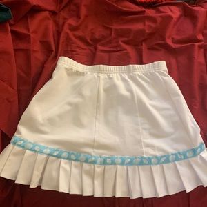 Both size small a onesie and skirt set